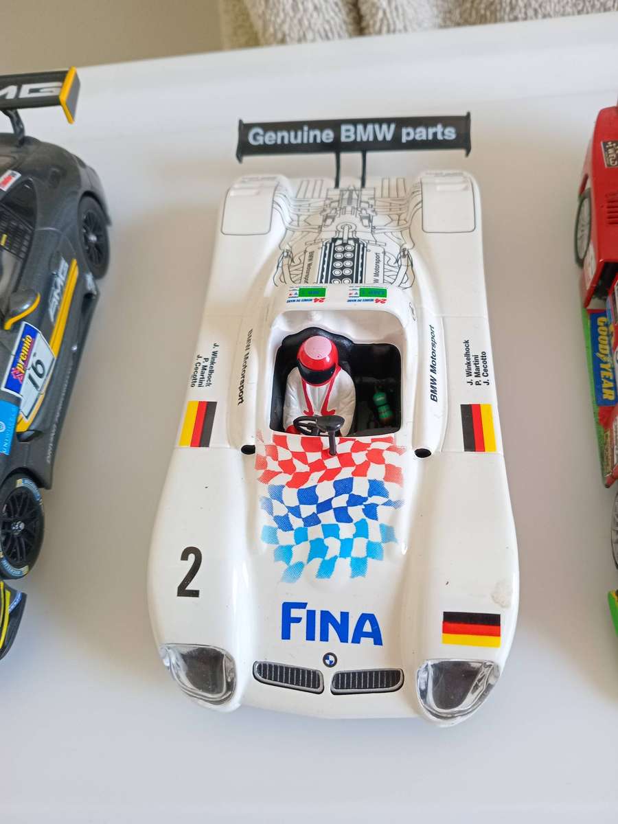 3 slot cars,  1x BMW ninco, 1 x scx Ford 1X Mercedes Benz Carrera Capri