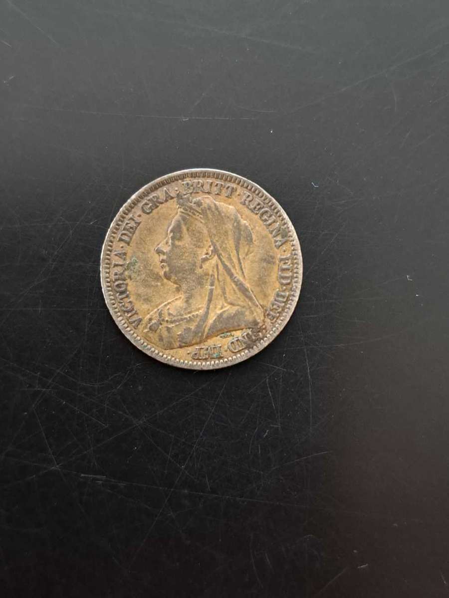 Silver colorized UK sixpence 1897