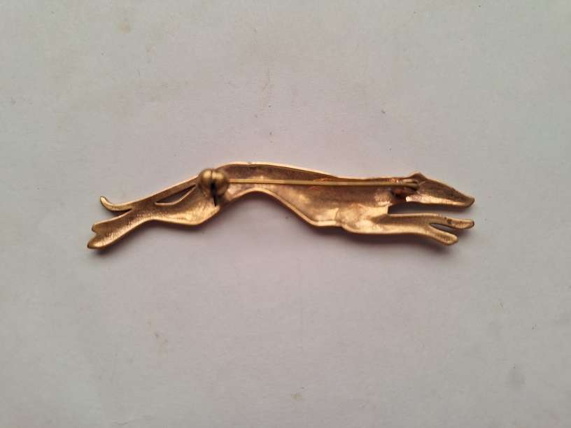 Brass greyhound brooch