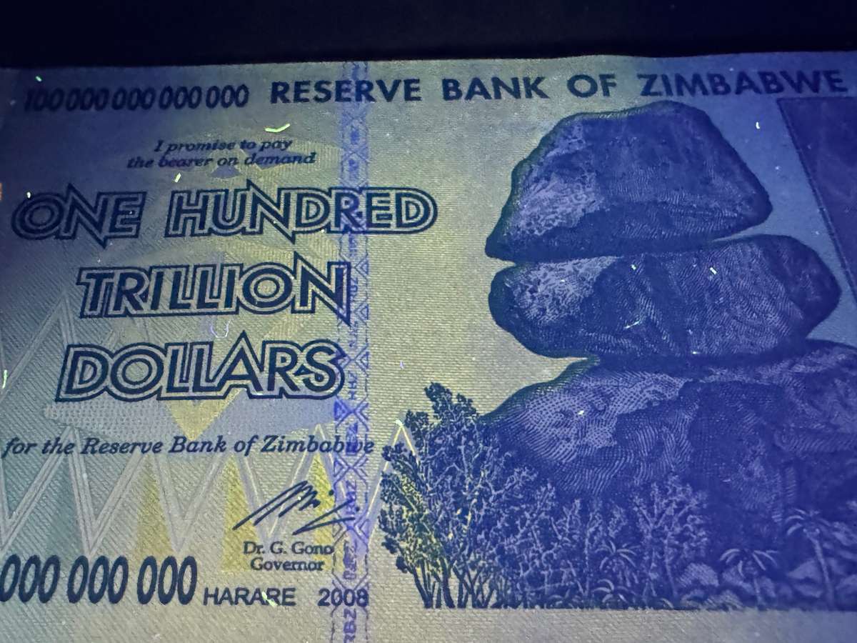 Six Authentic 100 Trillion Zimbabwe Banknotes