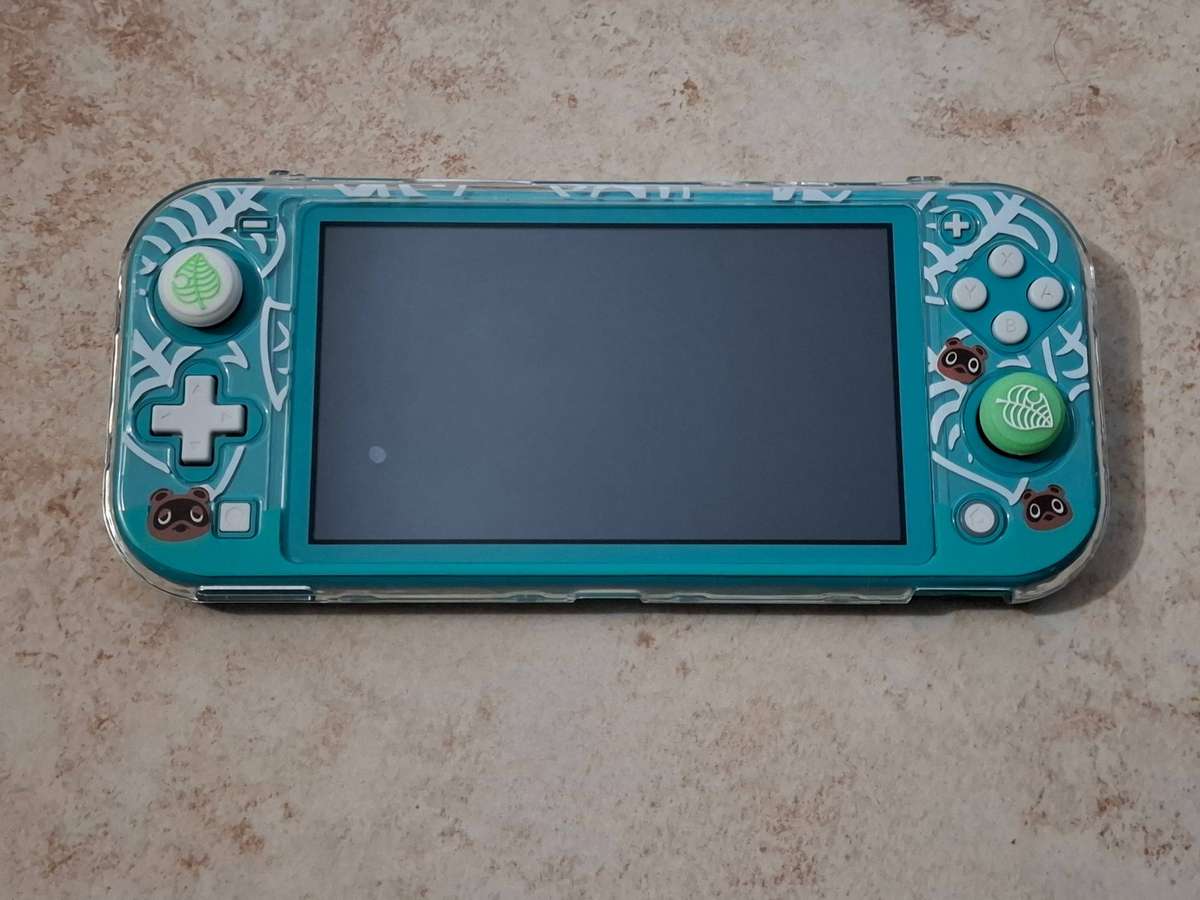 Nintendo Switch Lite (Turquoise) + Animal Crossing Protective Hard Case Shell