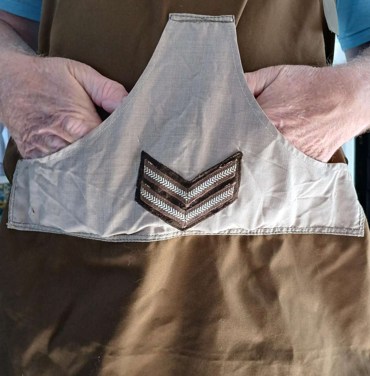 Apron, repurposed nutria, with pocket.