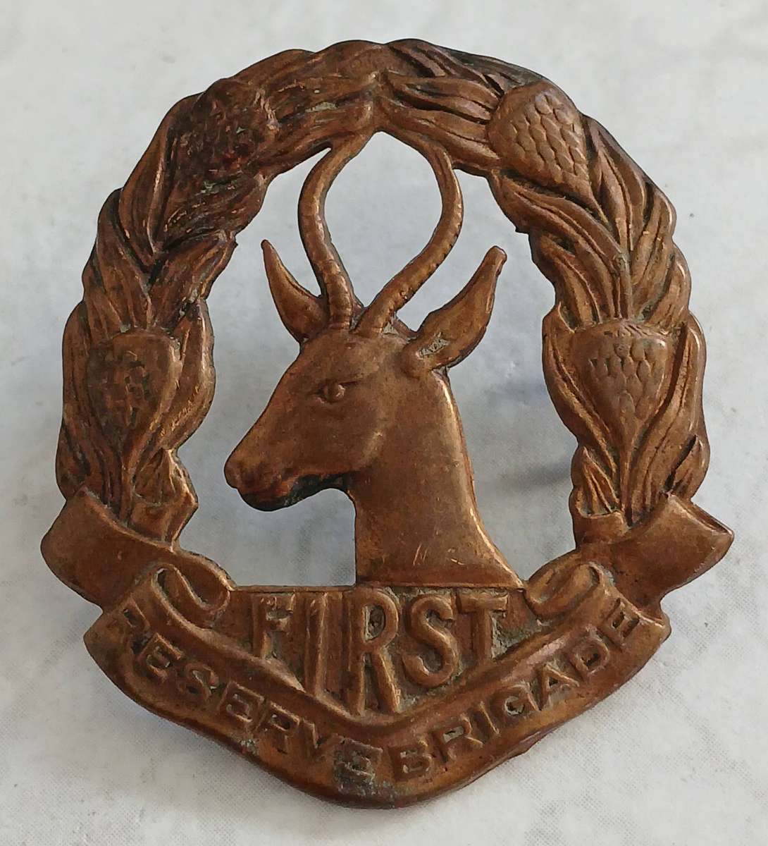WW2 First Reserve Brigade Cap Badge