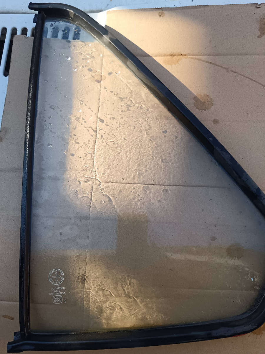 Golf 1 left rear quarter glass