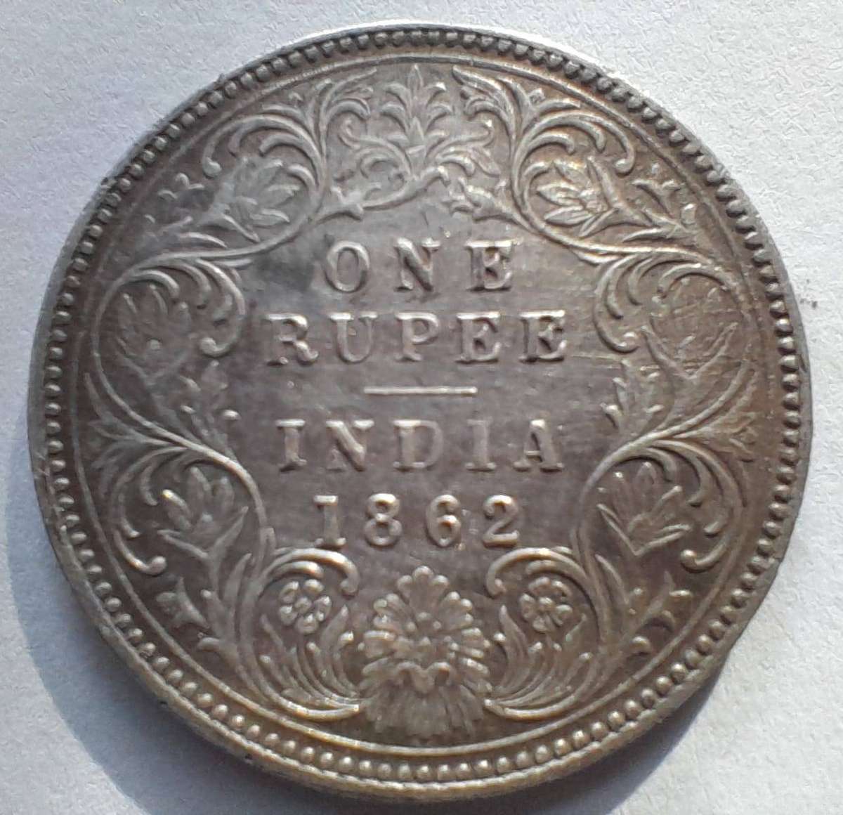INDIA - 1862 ONE RUPEE 917 FINE SILVER COIN-WEIGHT 11,5 GRAMS 31mm DIAMETER. ENCAPSULATED.
