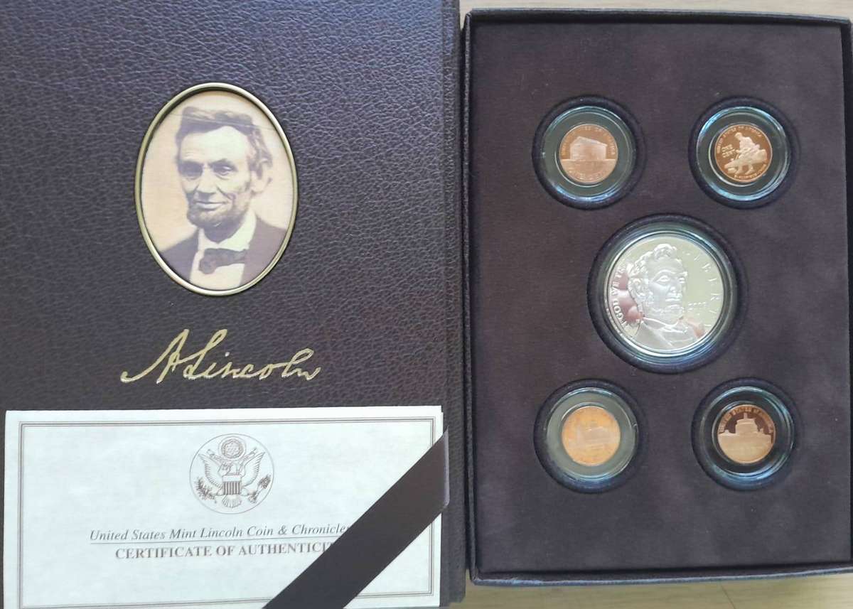 USA 2009 LINCOLN COIN & CHRONICLES SET including PROOF LINCOLN SILVER DOLLAR.