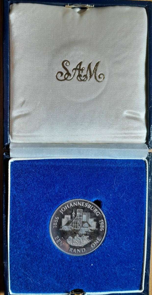 RSA 1986 PROOF SILVER R1 - LOVELY TONING ON THE REVERSE  SIDE - in LARGE SA MINT BOX no CAPSULE.