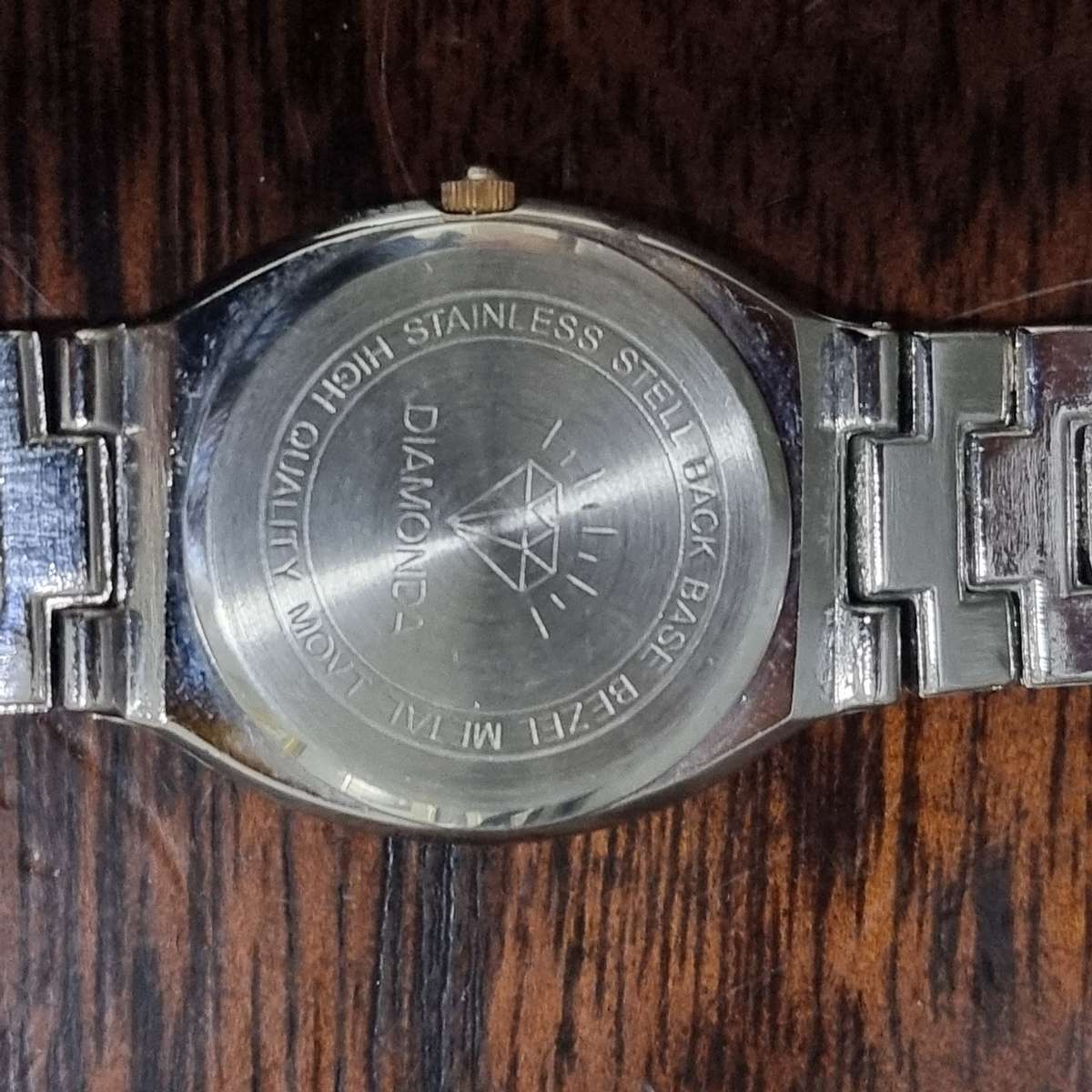 Diamonda Aim Watch with Quarts movement.