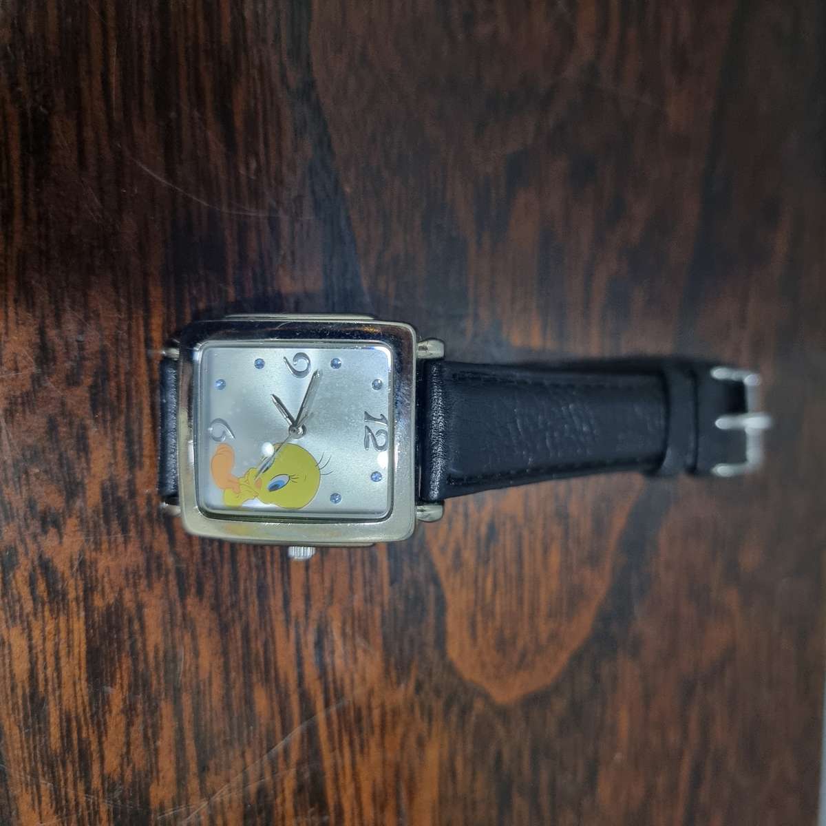Vintage Tweety Bird watch with silver face.
