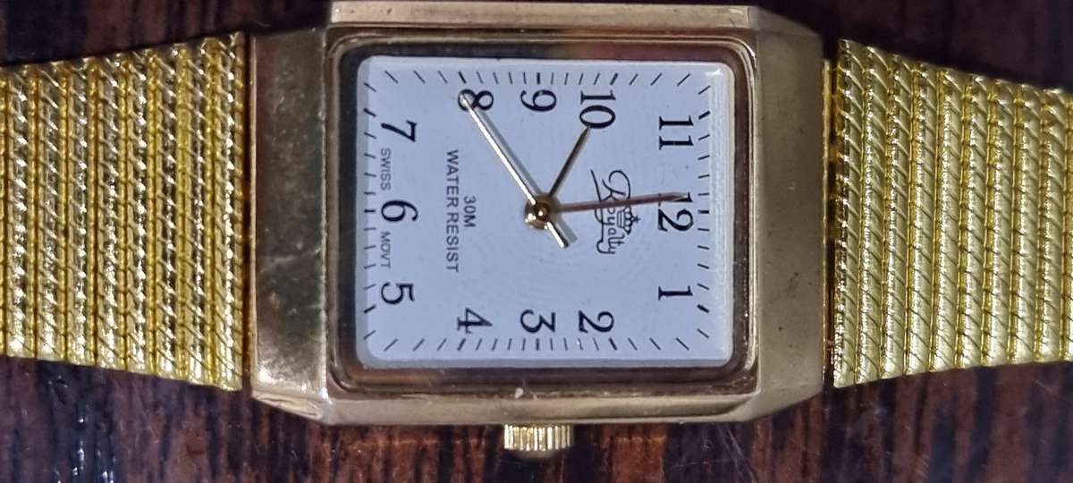 Royalty gold watch new.