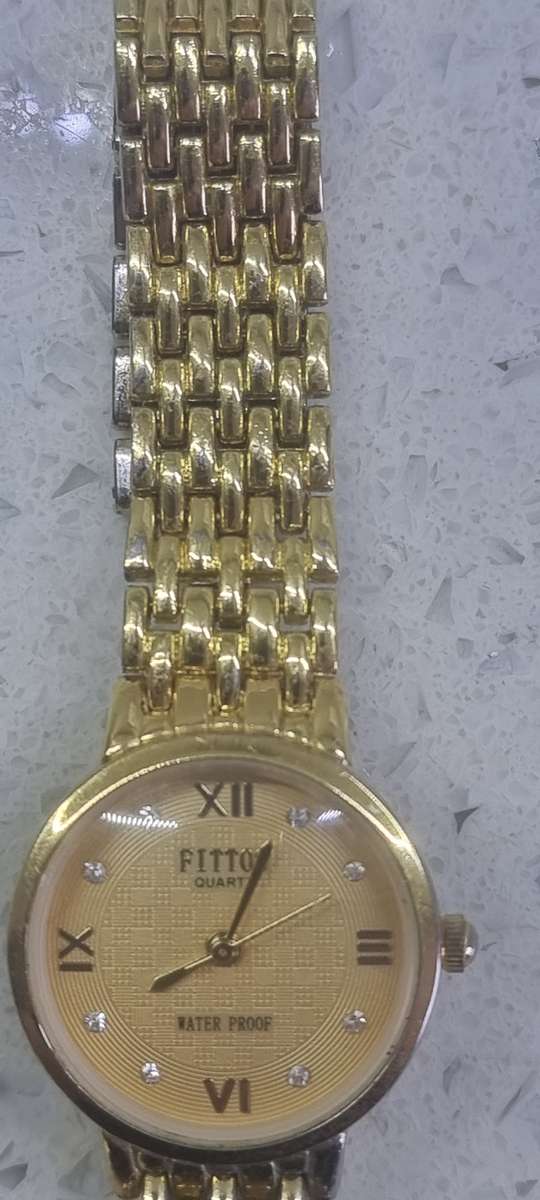 Fittos Quartz Watch in excellent condition.