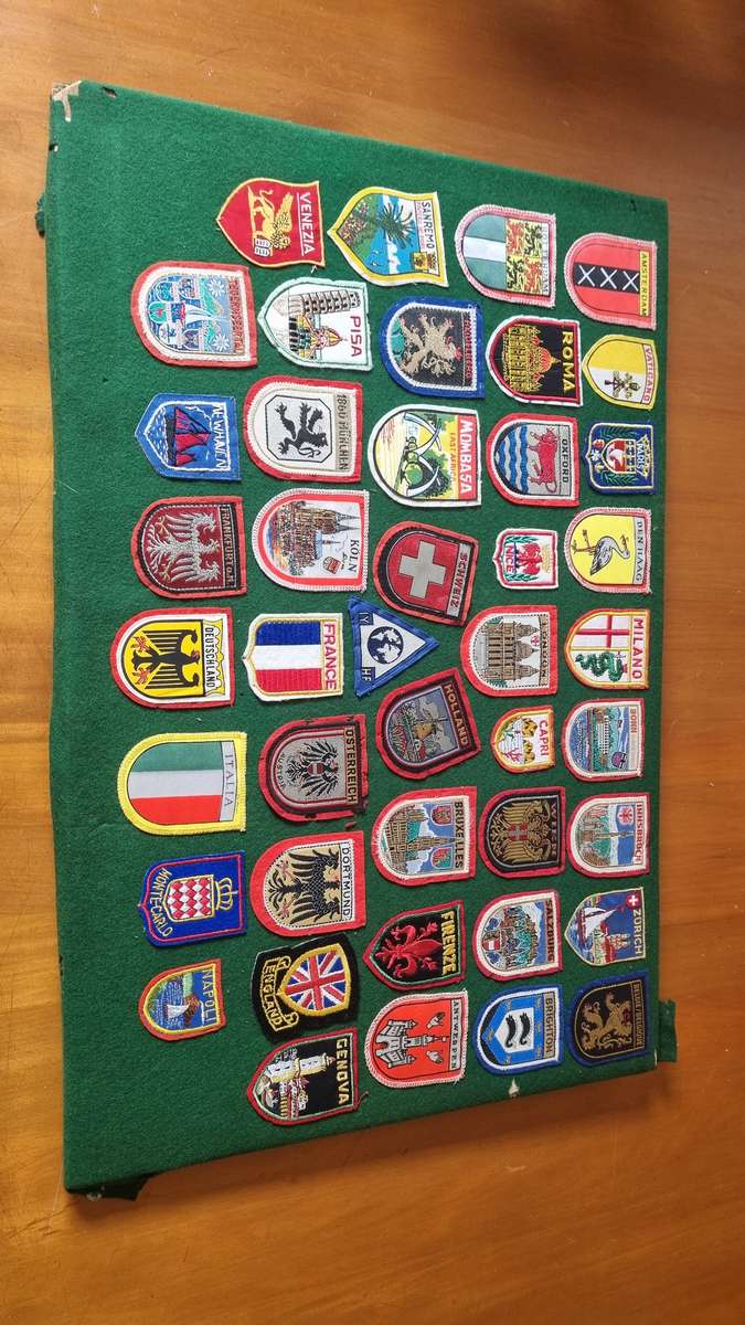 43 x Cloth Souvenir Badges in Excellent Condition neatly sewn patches, onto felt. Mombasa, Europe.