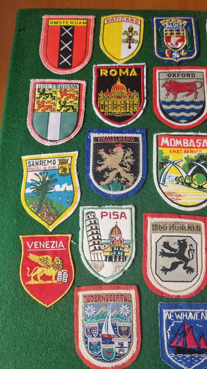 43 x Cloth Souvenir Badges in Excellent Condition neatly sewn patches, onto felt. Mombasa, Europe.