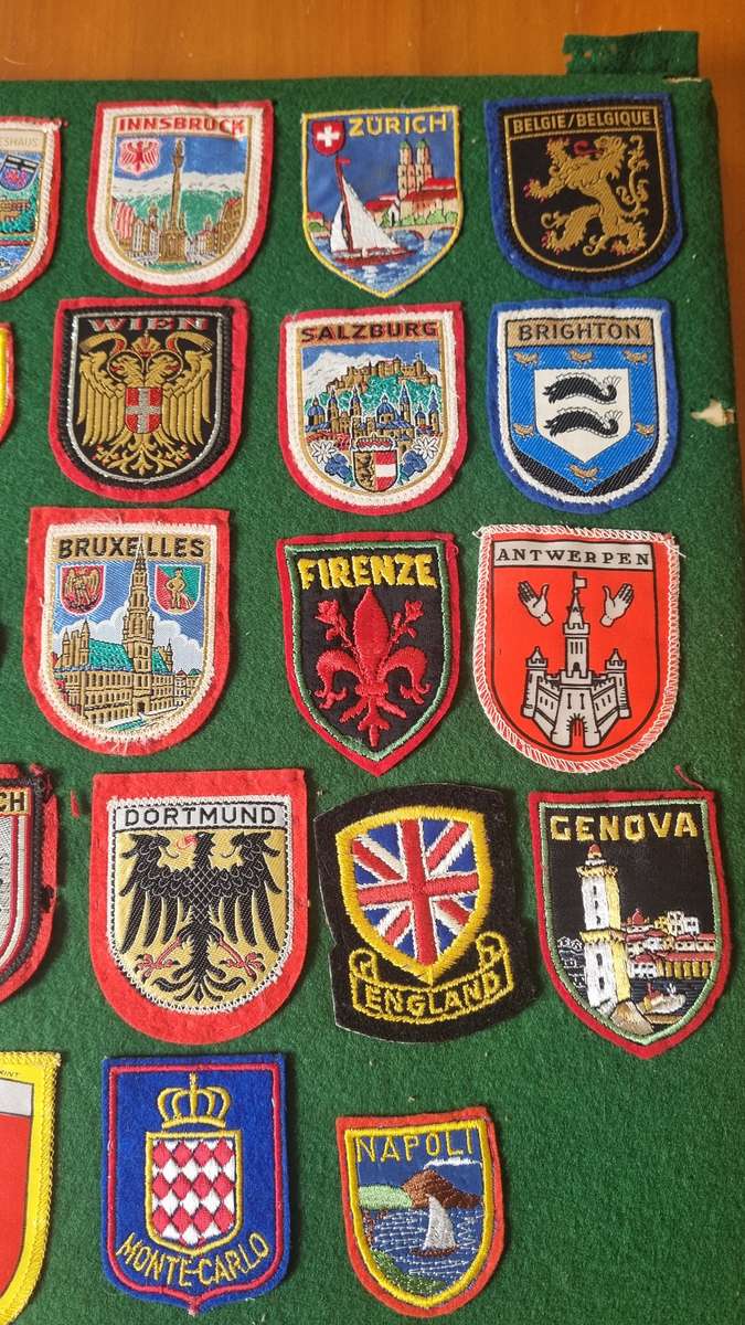 43 x Cloth Souvenir Badges in Excellent Condition neatly sewn patches, onto felt. Mombasa, Europe.