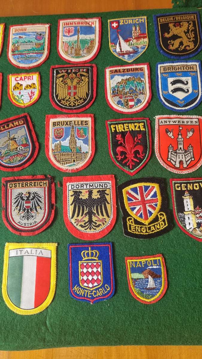 43 x Cloth Souvenir Badges in Excellent Condition neatly sewn patches, onto felt. Mombasa, Europe.