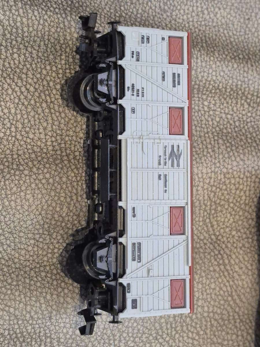 Toy Train Set. Locomotive with motor, 3 cars, and  14 tracks. Vintage British