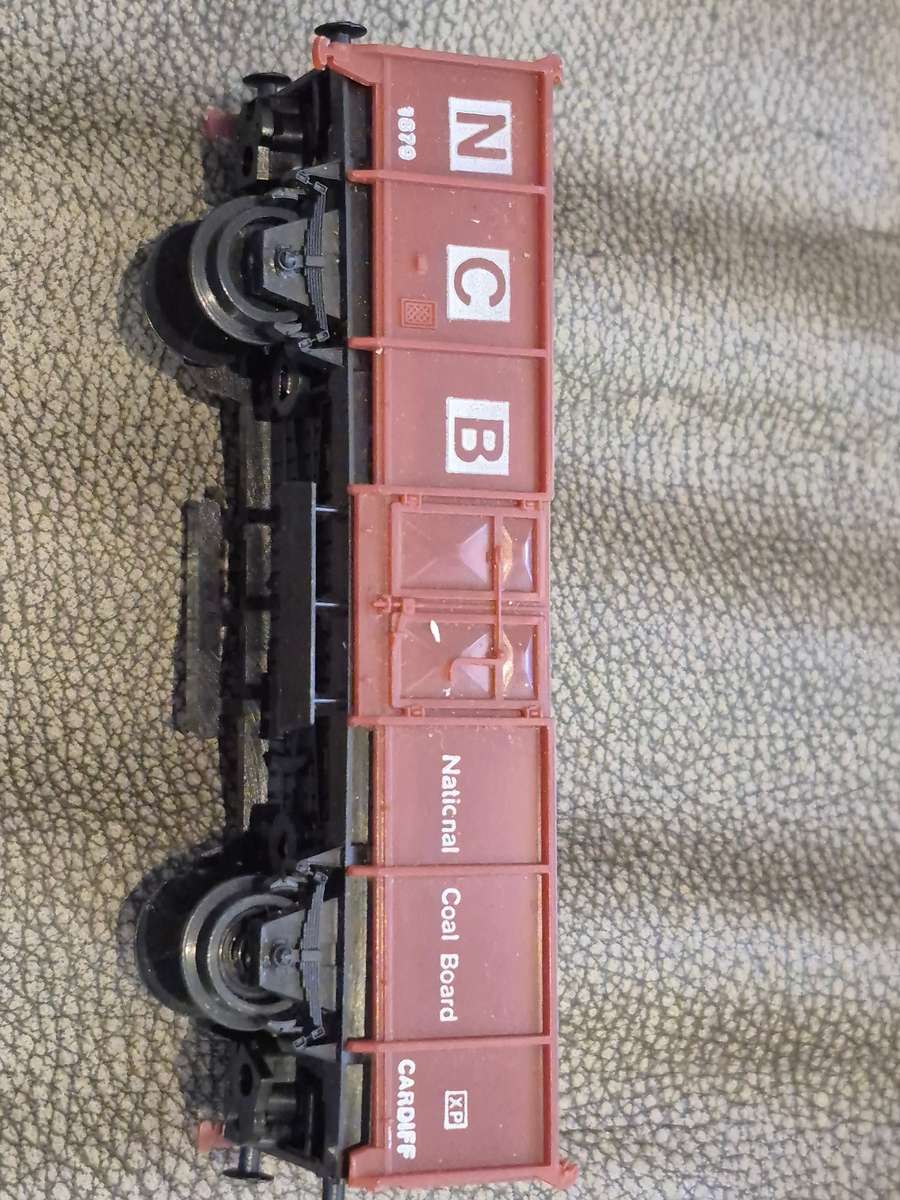 Toy Train Set. Locomotive with motor, 3 cars, and  14 tracks. Vintage British