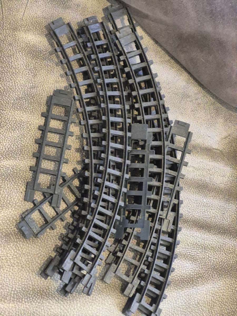 Toy Train Set. Locomotive with motor, 3 cars, and  14 tracks. Vintage British