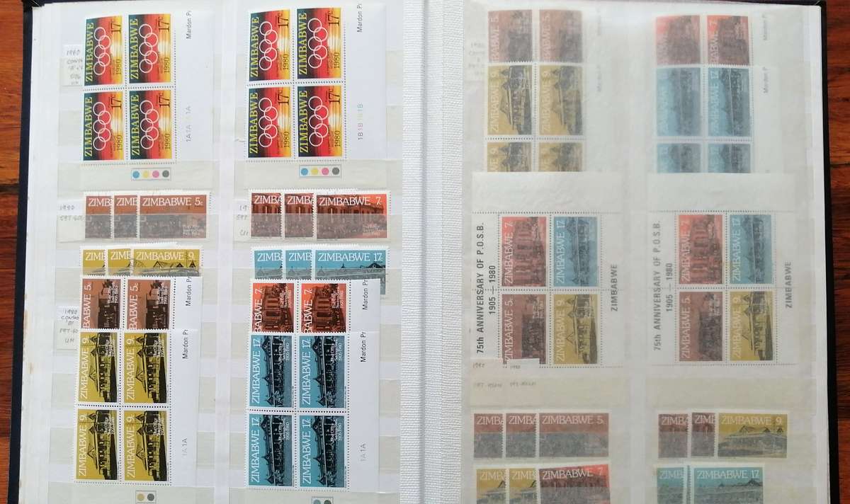 Later Rhodesia in 16 Pg album & Zimbabwe collection in 32 Pg - 2 second hand albums - not all shown