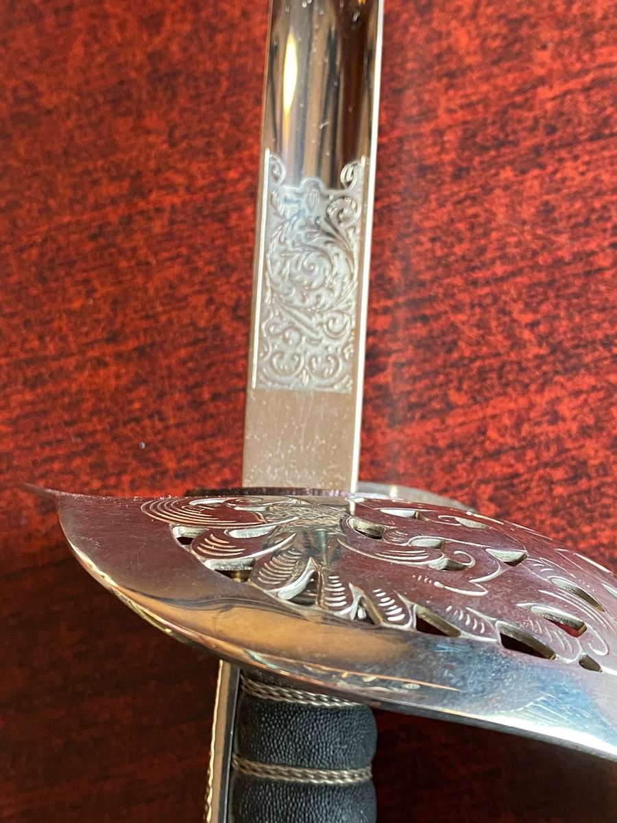 KENIA ARMED FORCES-BRITISH INFANTRY OFFICERS SWORD(1897 PATTERN)PIERCED GUARD BEARING THE ROYAL CIPH