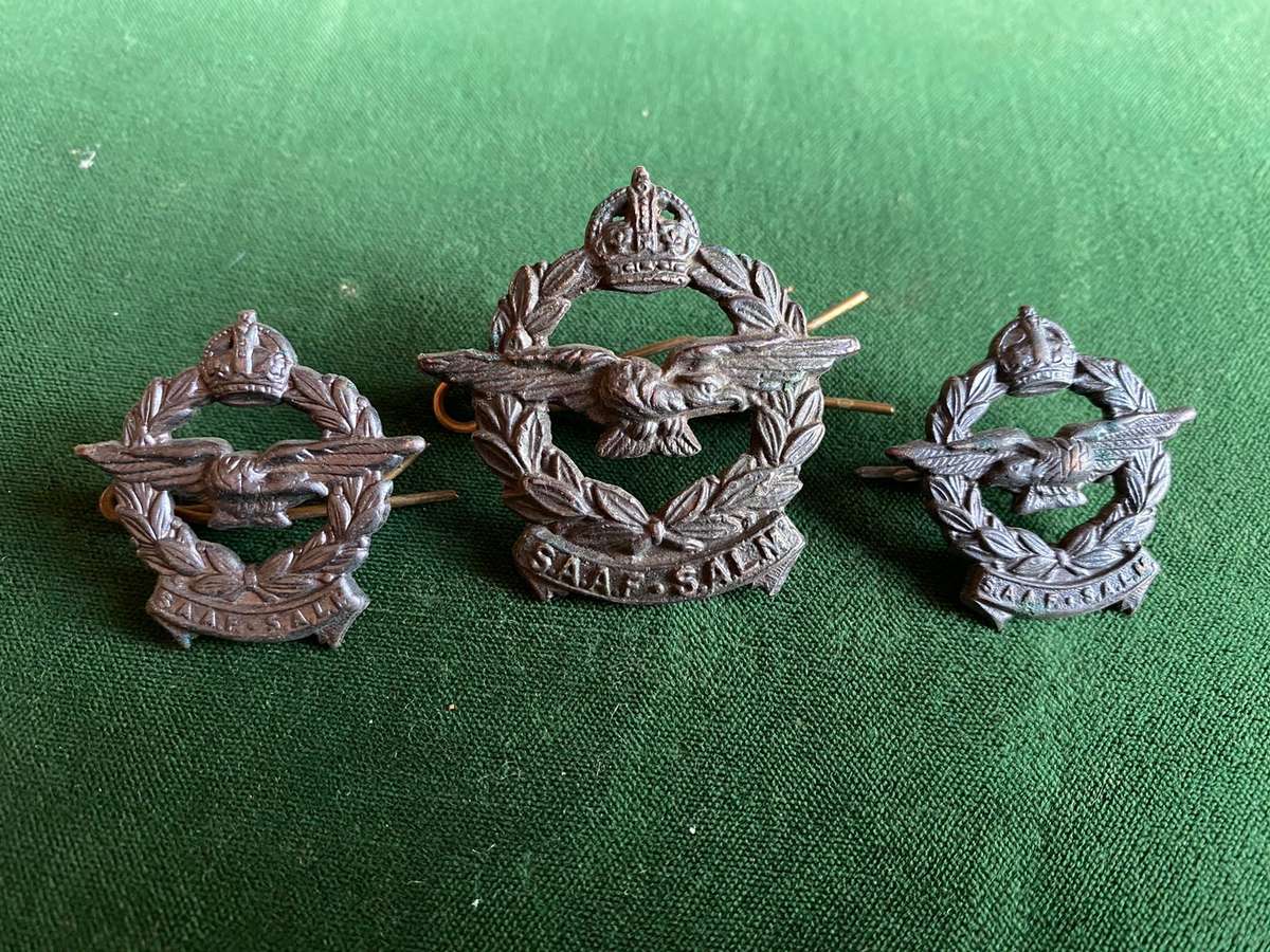 SAAF DARKENED BRASS CAP AND COLLARS-WORN WW2-LUGS INTACT