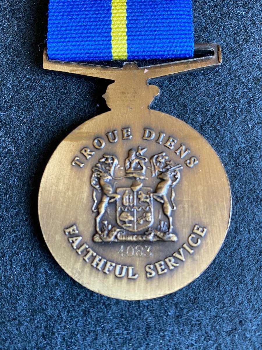 FULL SIZE POLICE 10 YEAR SERVICE MEDAL-NUMBERED