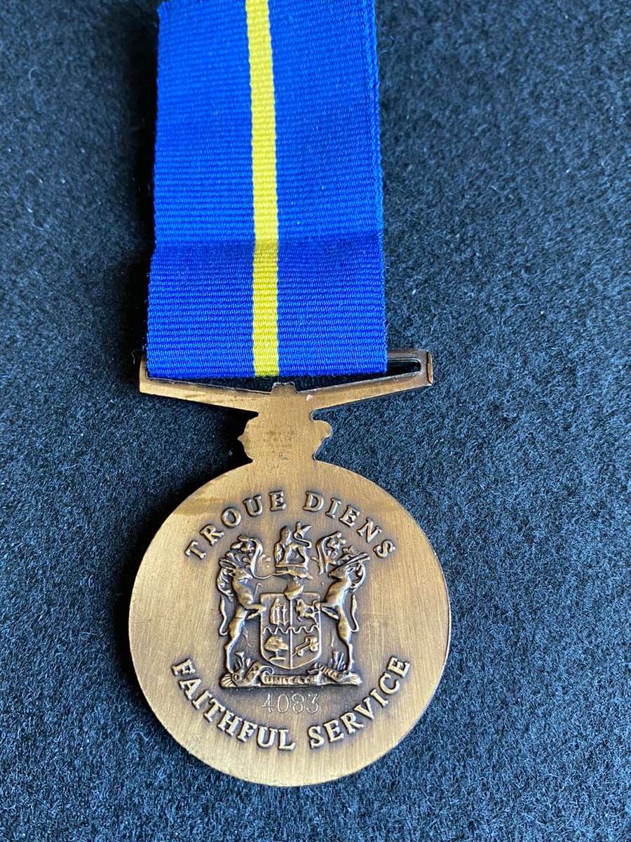FULL SIZE POLICE 10 YEAR SERVICE MEDAL-NUMBERED