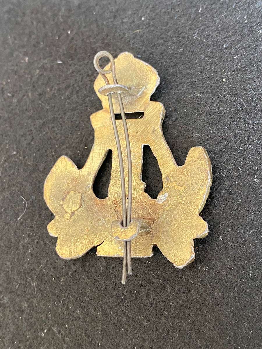 BANDSMAN ARM BADGE CASTING-WORN WW2