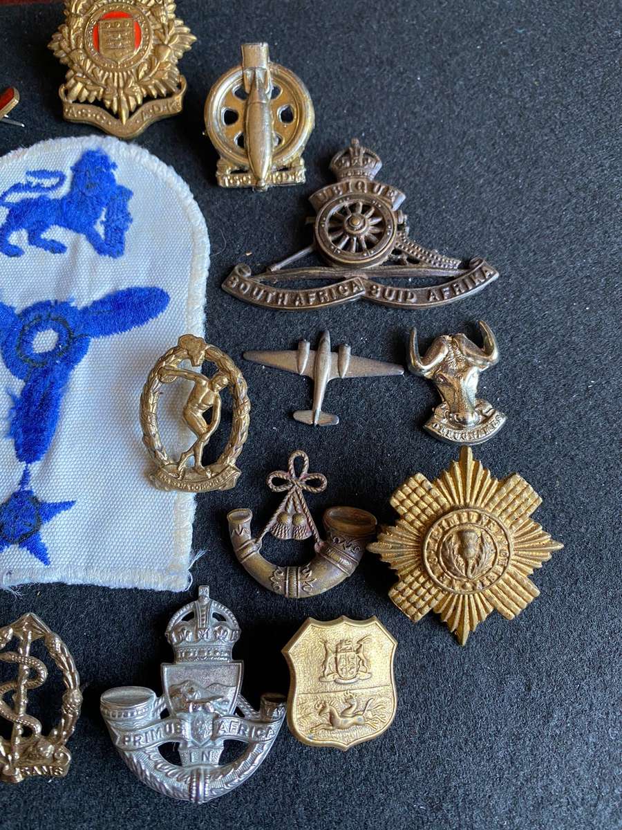 MIXED LOT OF BADGES-SOLD TOGETHER-18 IN TOTAL-SOME MISSING PINS