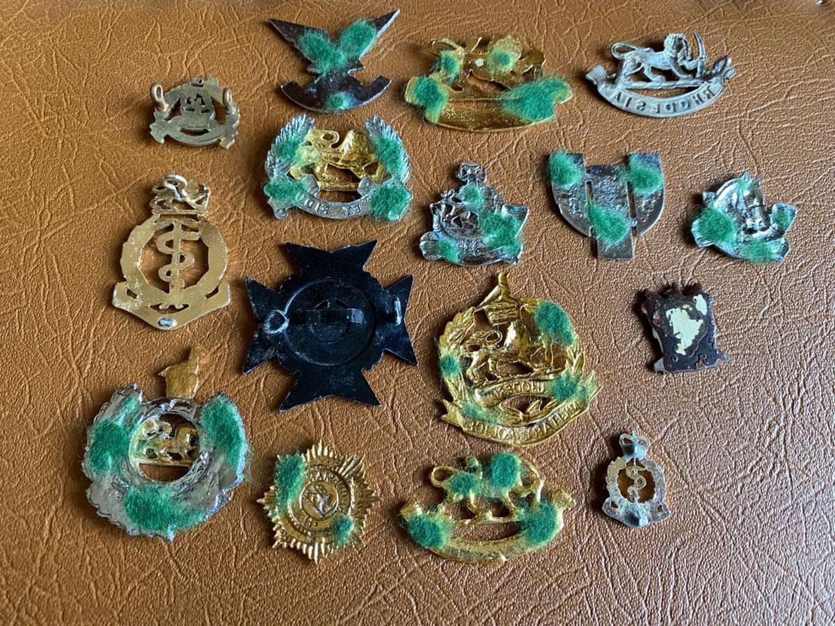 MIXED LOT OF RHODESIAN BADGES-MOST WITHOUT LUGS- 16 IN TOTAL