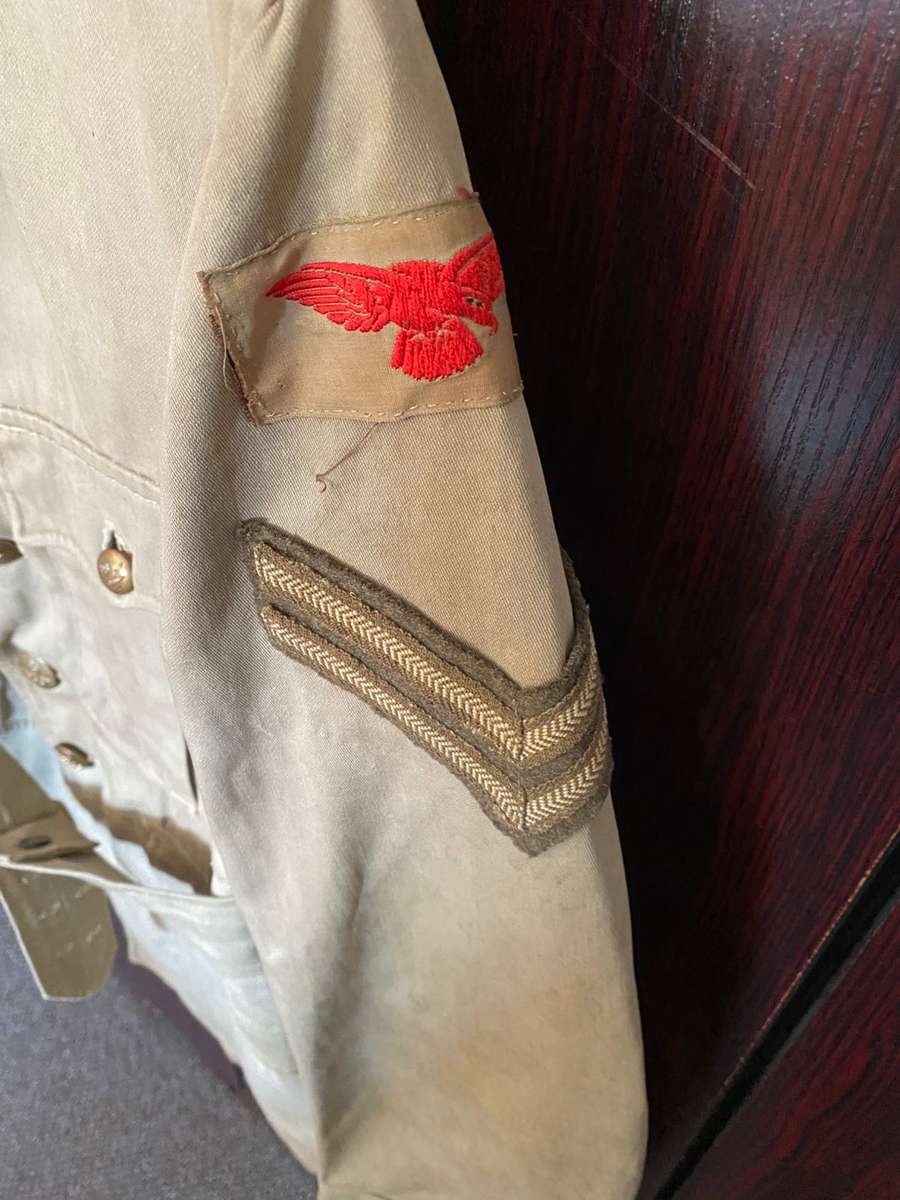 RAF NON COMMISSIONED OFFICER TUNIC AS WORN  IN THE NORTH AFRICAN CAMPAIGN- LABELLED AND DATED 1942-S