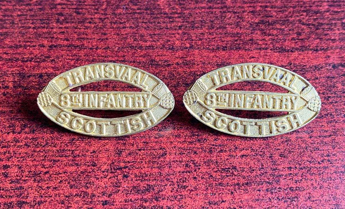 TRANSVAAL SCOTTISH GILDING METAL TITLE PAIR-MADE FOR AND ONLY WORN FOR THE 75TH ANNIVERSARY PARADE I