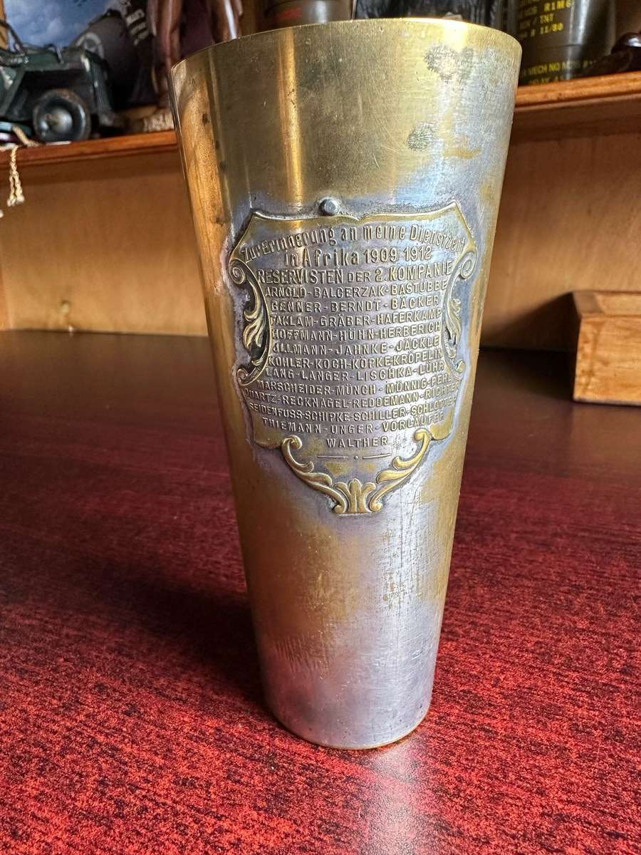GERMAN SWA-SILVER PLATED BRASS RESERVISTENBEEHER-THIS CUP IS EMBOSSED ON ONE SIDE WIITH A VIEW OF A