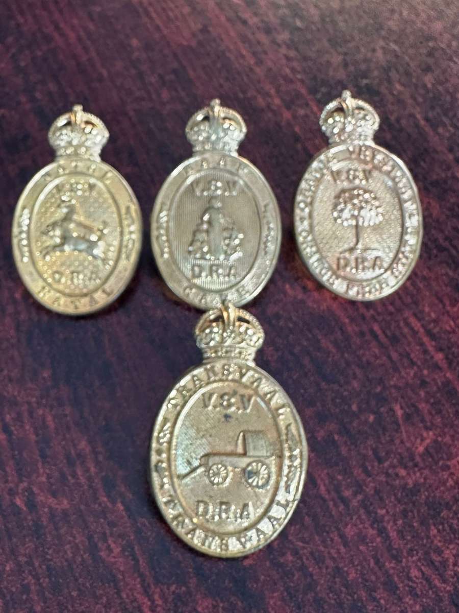 Rifle association badges for Cape, Free State, Transvaal and Natal. Lugs intact
