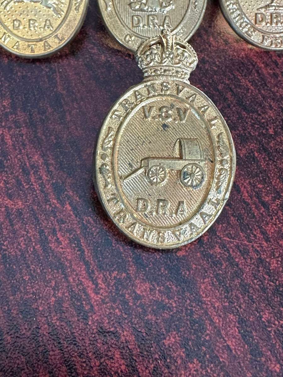 Rifle association badges for Cape, Free State, Transvaal and Natal. Lugs intact