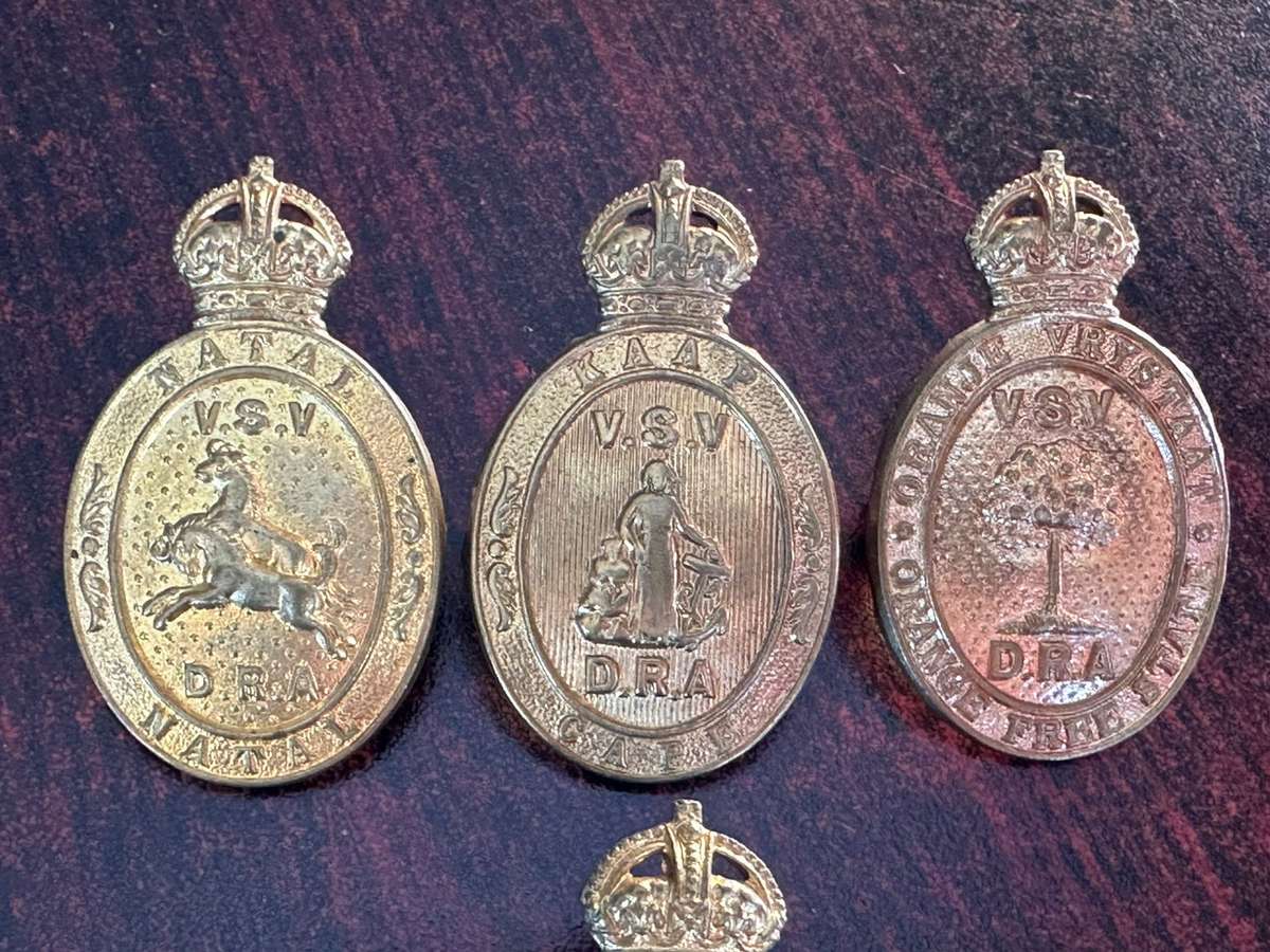 Rifle association badges for Cape, Free State, Transvaal and Natal. Lugs intact