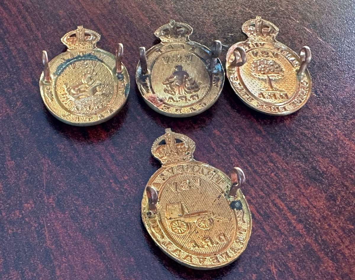 Rifle association badges for Cape, Free State, Transvaal and Natal. Lugs intact