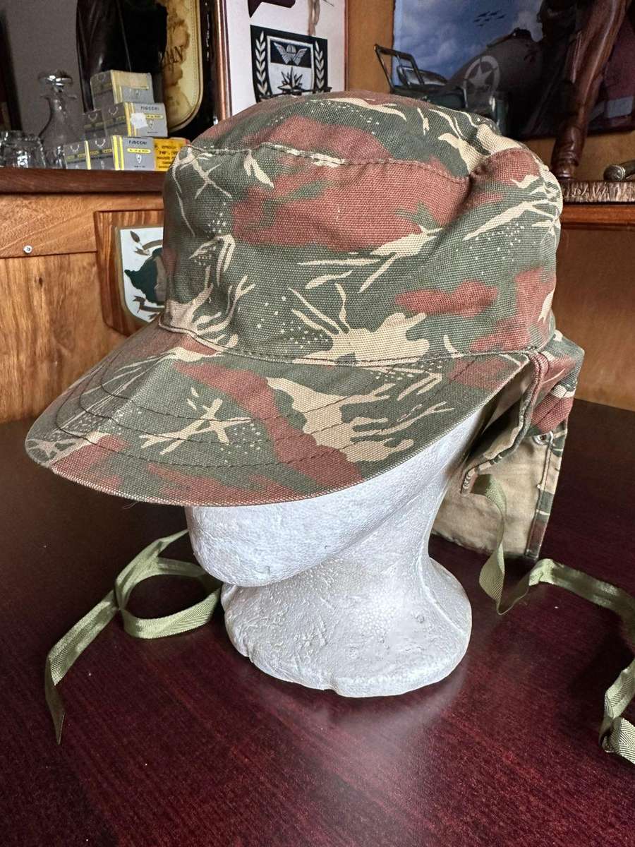 Koevoet camo flap cap in almost unused condition. Size 55.