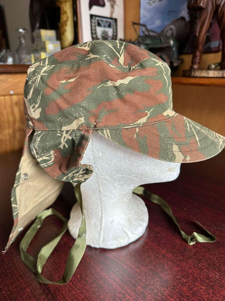 Koevoet camo flap cap in almost unused condition. Size 55.