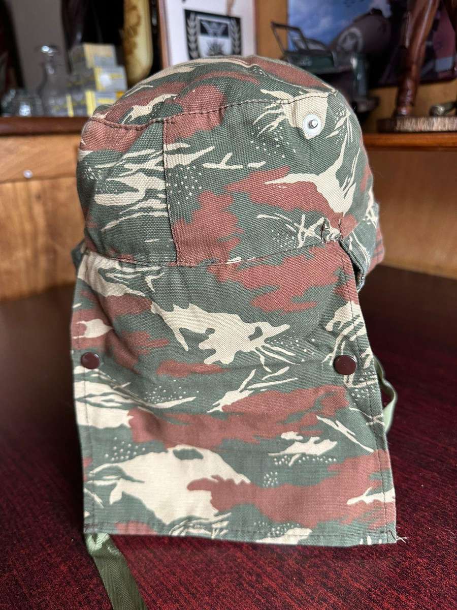 Koevoet camo flap cap in almost unused condition. Size 55.