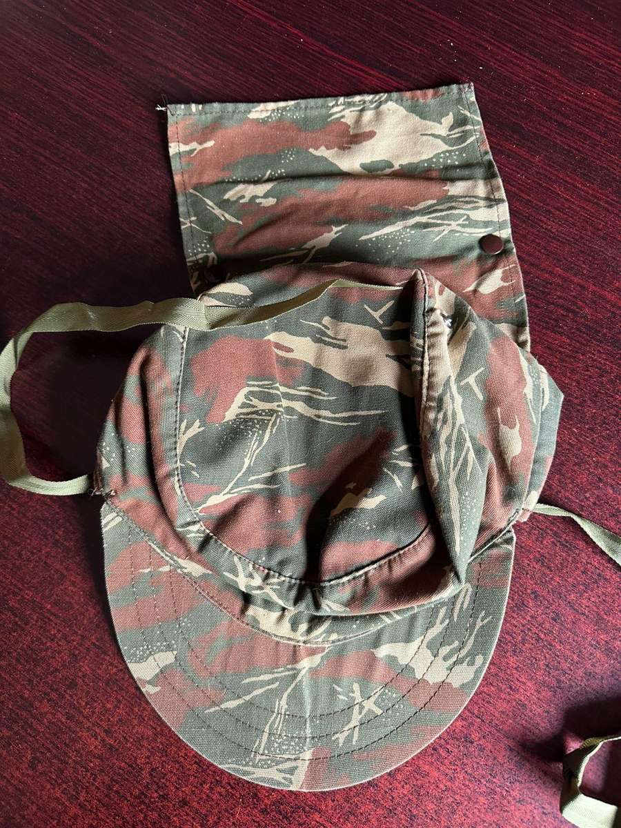 Koevoet camo flap cap in almost unused condition. Size 55.