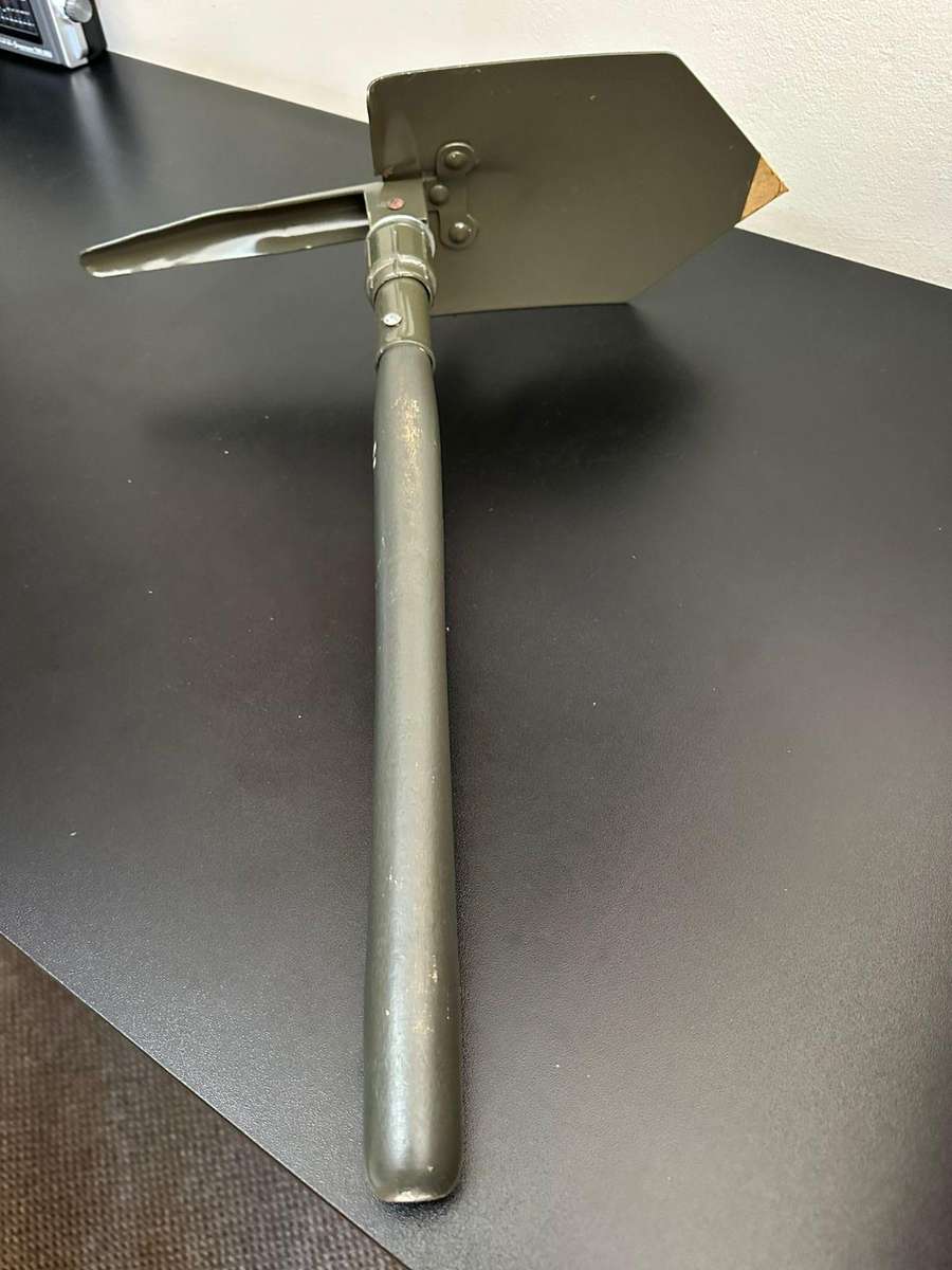 Portable, foldable spade with pick on the one side,length folded 47cm. Condition unused