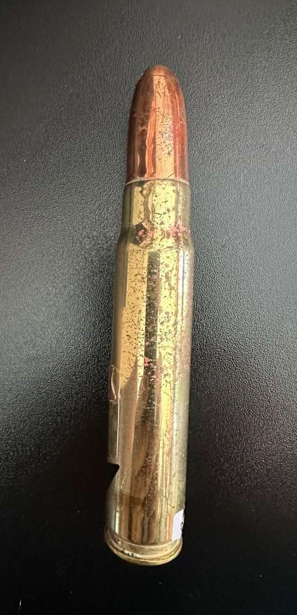 Rhodesia 20 mm spend round made into a bottle opener.