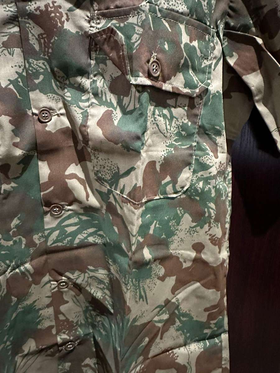 Task force 2nd pattern camo,short sleeve shirt,labelled and daterd 78,size medium. Measures 60 cm ar