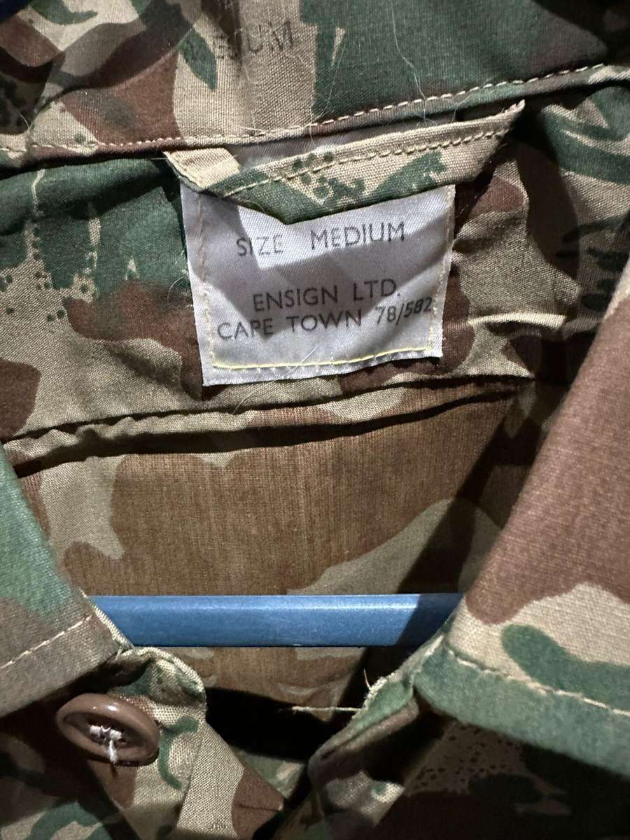 Task force 2nd pattern camo,short sleeve shirt,labelled and daterd 78,size medium. Measures 60 cm ar