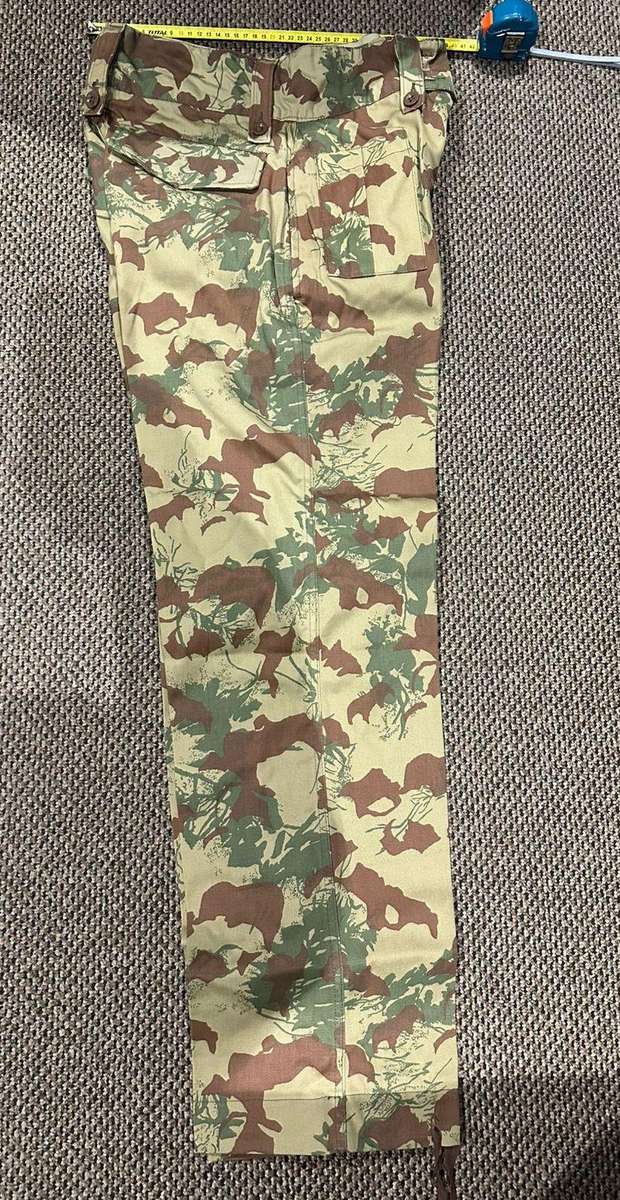 Task force 2nd pattern trousers, size 36, labelled and dated 1981. Condition unworn. Pipe length 82