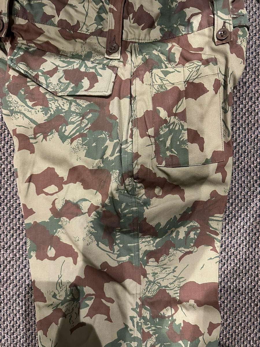 Task force 2nd pattern trousers, size 36, labelled and dated 1981. Condition unworn. Pipe length 82