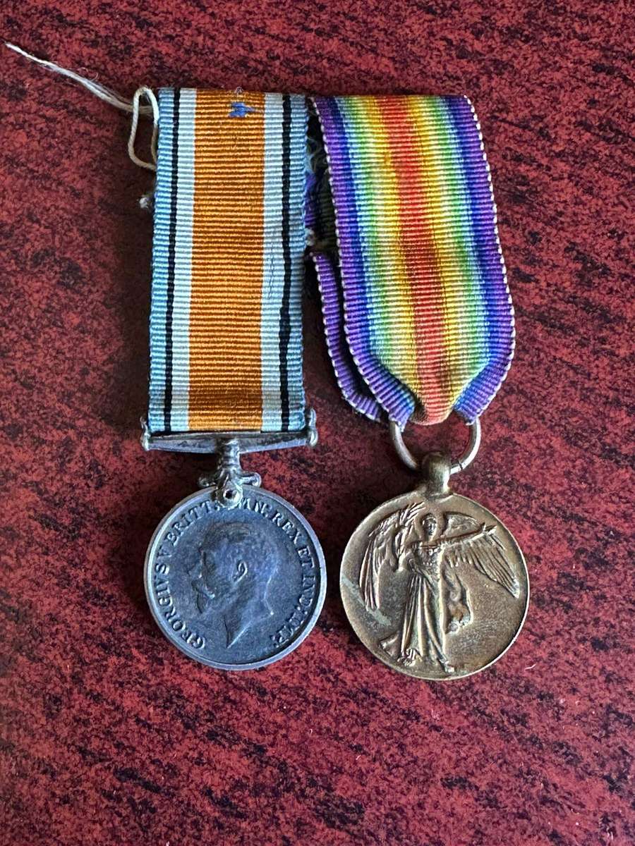 Authentic WW1 miniature medal pair.