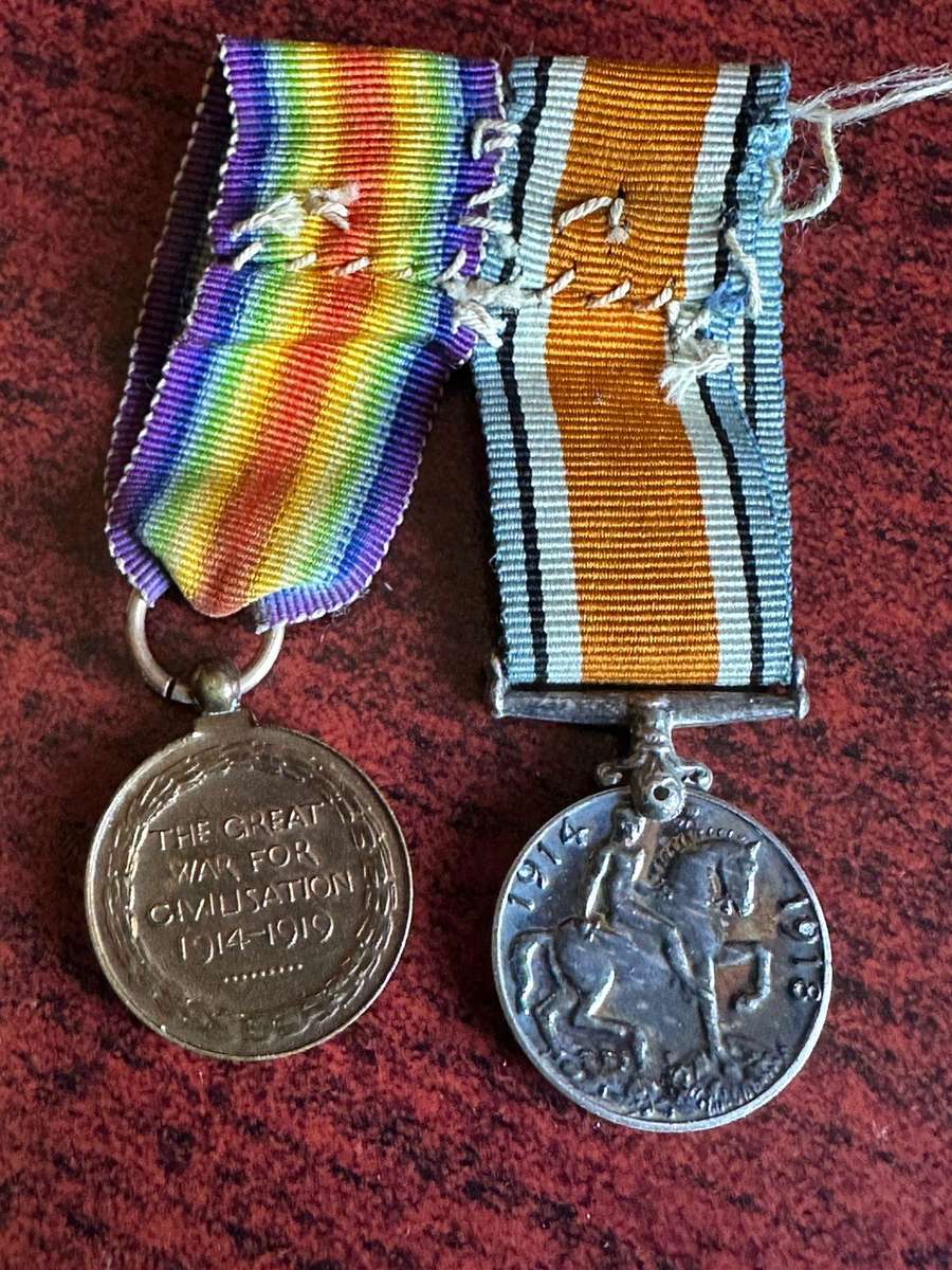 Authentic WW1 miniature medal pair.