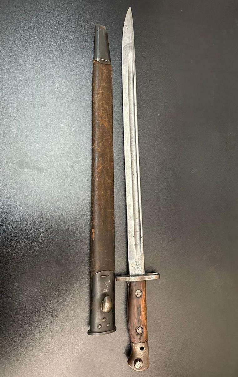 1907 Pattern bayonet with scabbard by Wilkinson. Still good condition.